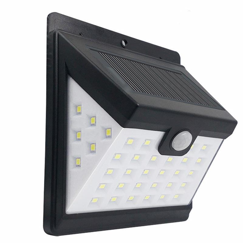 Prive Exterior Solar Wall Light with Motion Sensor - Divine Heart L.A.