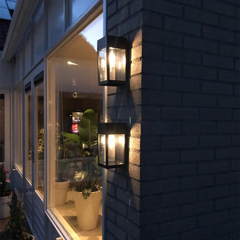 Tennyson Exterior LED Solar Wall Light in Black - Divine Heart L.A.